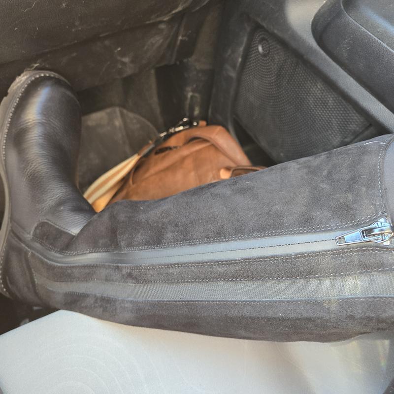 Love the strip of material that runs parallel to the zipper.