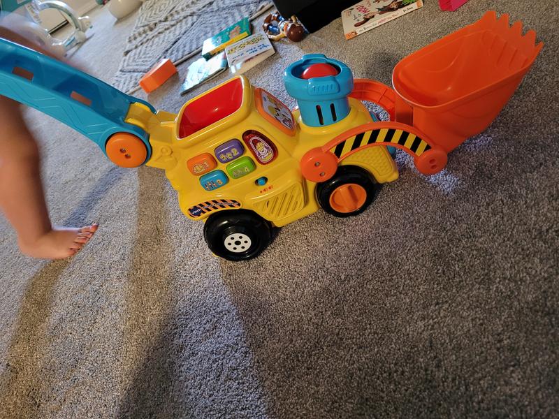 Side view of my toddler playing with it. She's obsessed!!