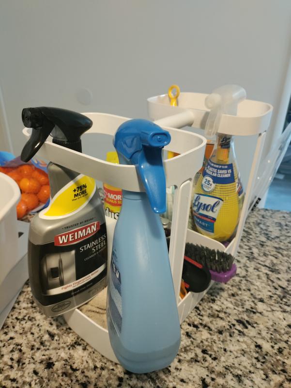 Premium AI Image  Close up of cleaning supplies in a bathroom caddy