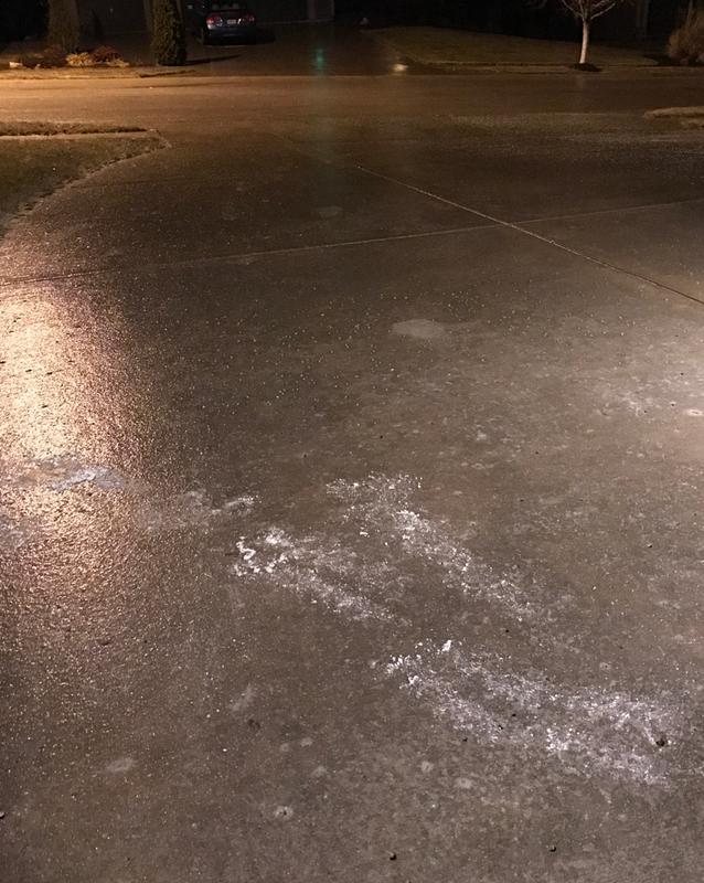 Driveway on a hill covered in ice - NO SLIPPING WITH YAKTRAX!