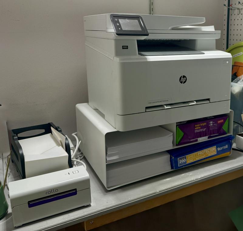 Customer photo for "Stand that Holds Up to HP’s Heavy Footprint and Weight!"