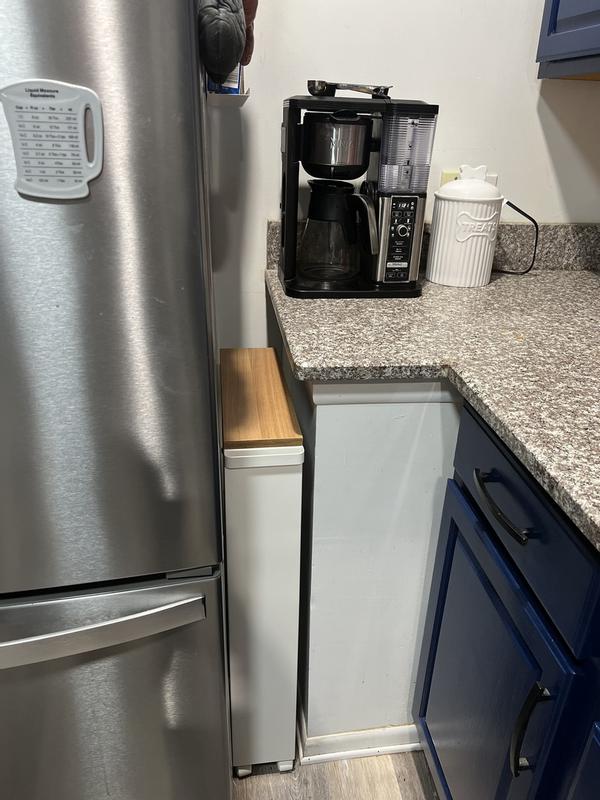 Customer photo for "This cart made an unusable space a storage space saver!"