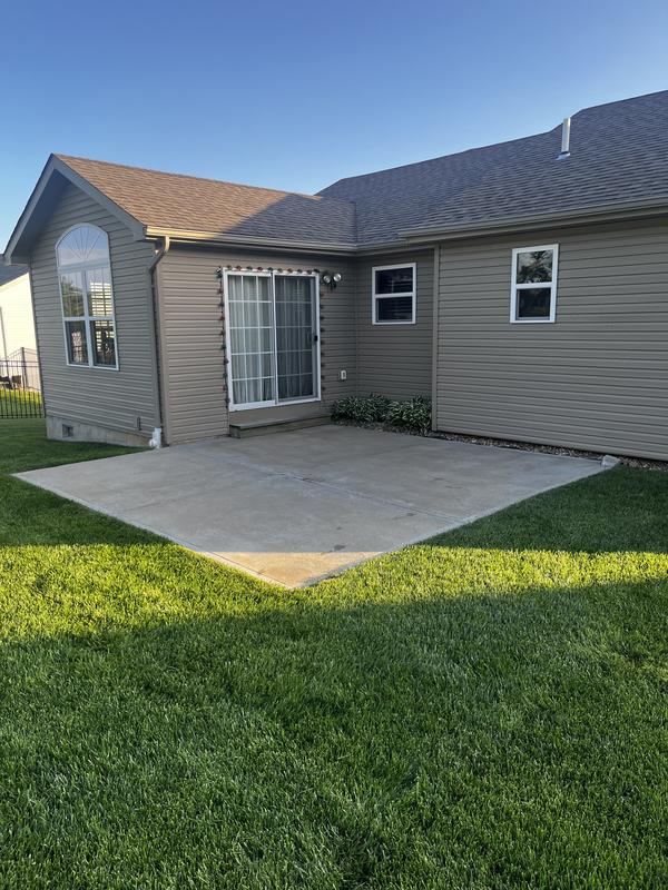 Our small patio before our upgrade.