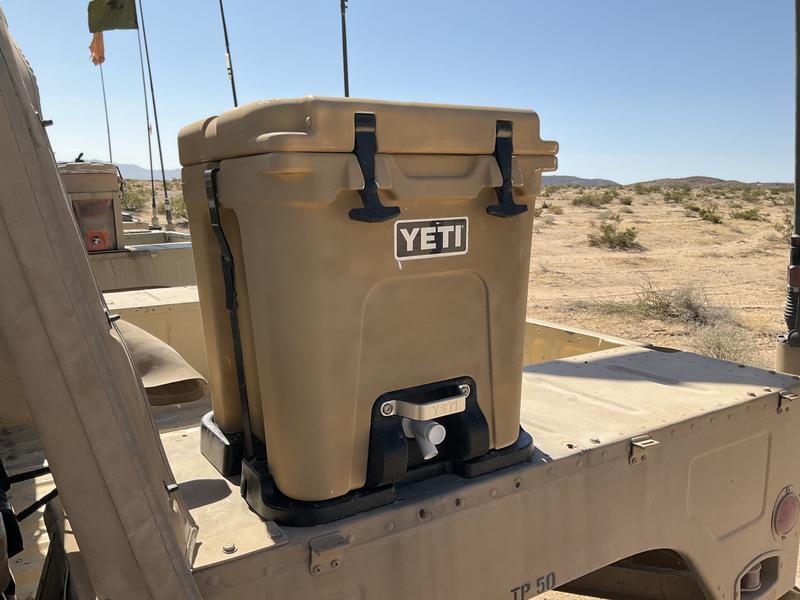 Yeti cooler with store spout