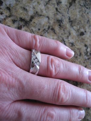 Men's 1/4 CT. T.W. Diamond Three Stone Abstract Slant Men's 1/4 CT. T.W. Diamond Three Stone Abstract Slant