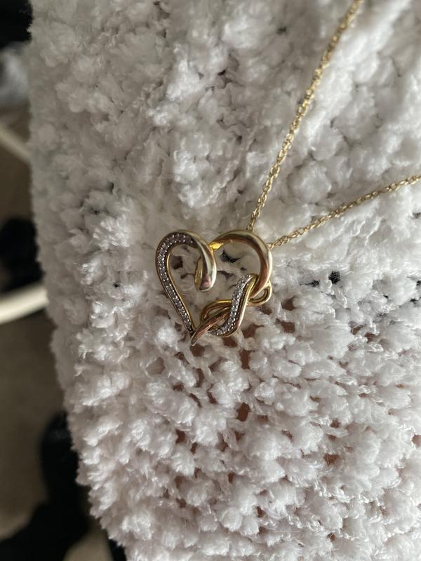 1/8 CT. T.W. Diamond Infinity and Swirl Heart Pendant in