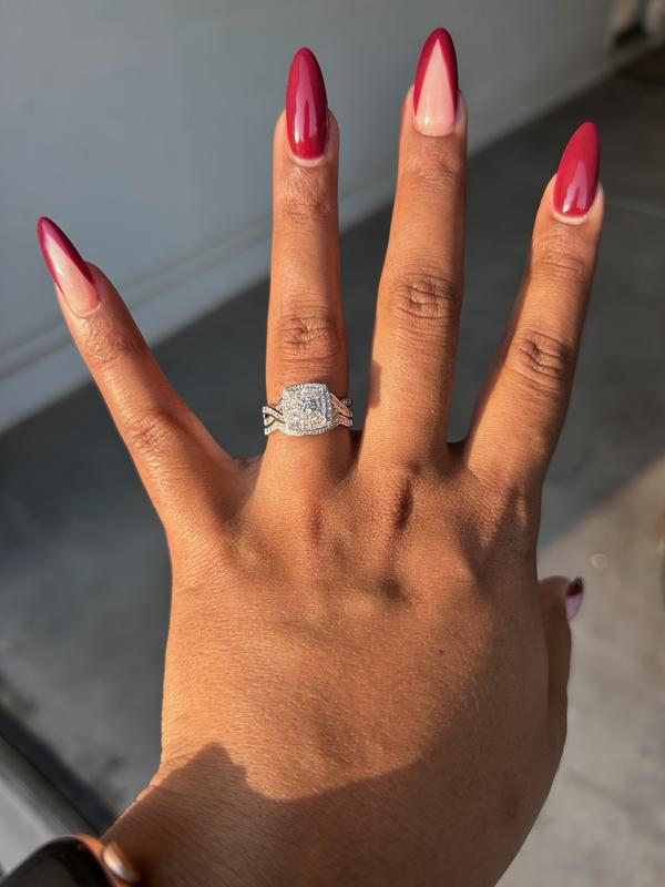 1/4 CT. T.W. Diamond Cushion and Round Triple Frame Twist 1/4 CT. T.W. Diamond Cushion and Round Triple Frame Twist