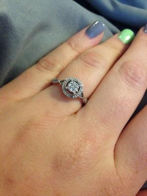 1/5 CT. T.W. Diamond Cluster Frame Ring in Sterling Silver
