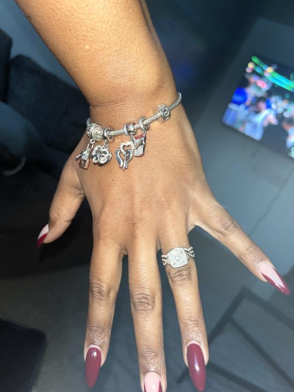1/4 CT. T.W. Diamond Cushion and Round Triple Frame Twist 1/4 CT. T.W. Diamond Cushion and Round Triple Frame Twist