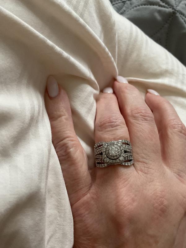 1 CT. T.W. Diamond Twist Split Shank Solitaire Enhancer in