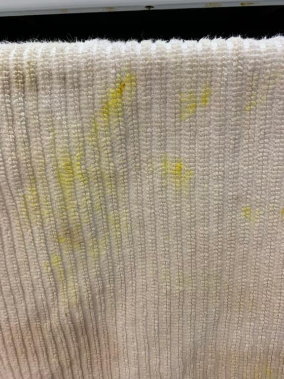 Stained kitchen towel from touching after handling product