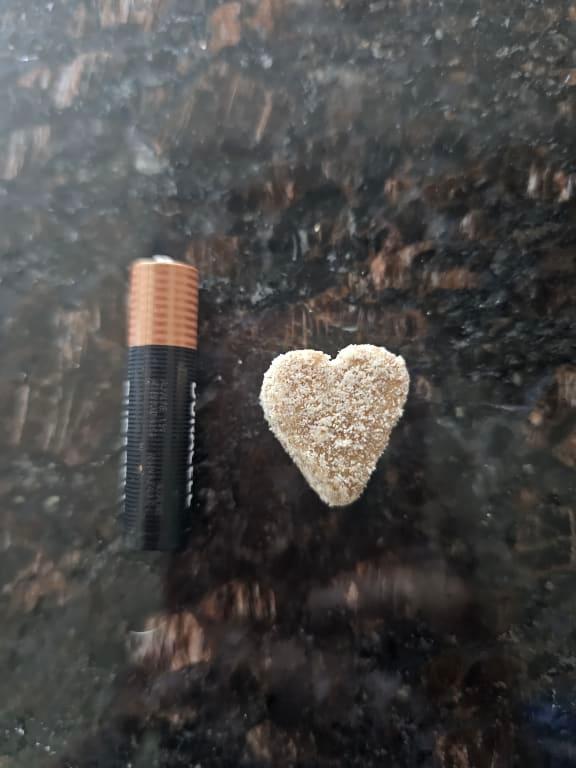 For size reference next to a triple a battery