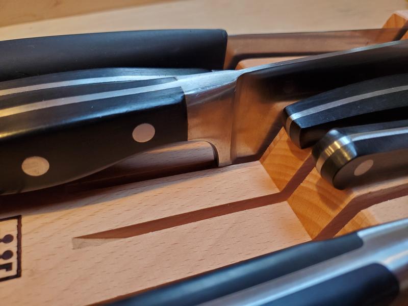 Full bolster does not sit fully in groove.