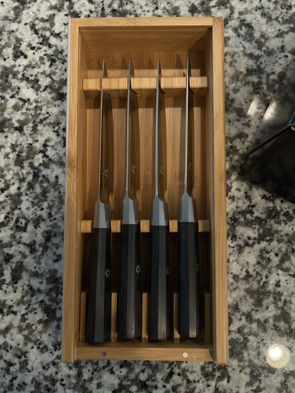 Knives in wooden storage box (cover off)