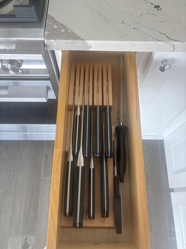 Looks perfect and has extra slots for adding more knives!