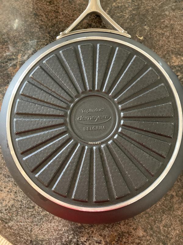 First signs of wear after a dozen uses on a metal burner grate.
