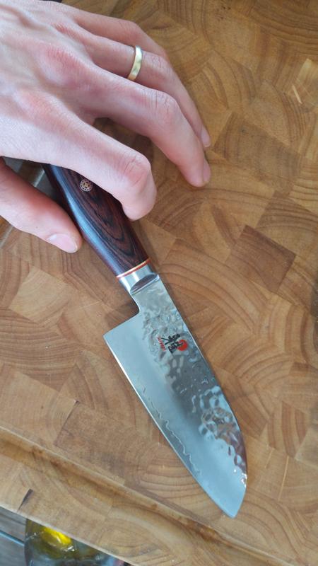 Shorter blade, feels fantastic for quick chopping