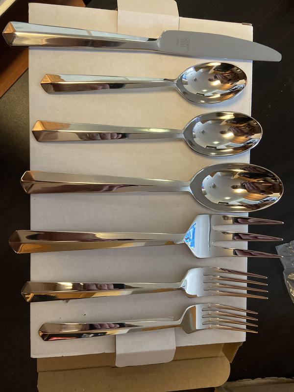 Serving spoon and fork pictured in middle