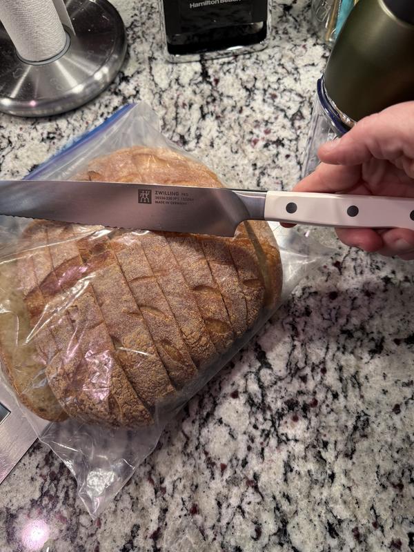 Sawed right on through my overproofed hard crust loaf! Haha