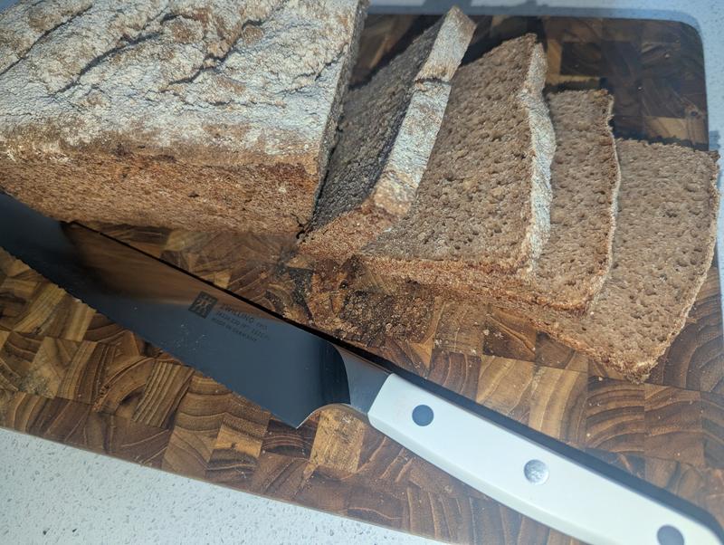 Pure rye bread - very dense with a hard crust: the cuts are thin and perfect!