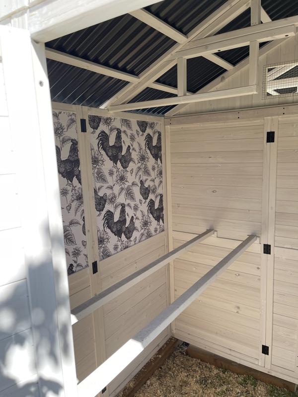 Added some wallpaper for a cute touch and it’s so nice for cleaning and makes it look so fancy!